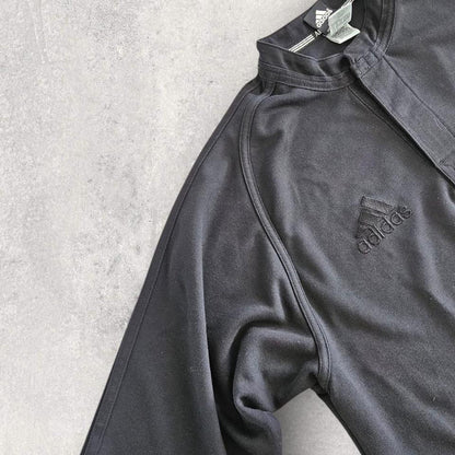 Vintage Adidas black High Collar Tshirt - L T-Shirts 75.00 NIS ADIDAS Vintage Adidas black High Collar Tshirt - L