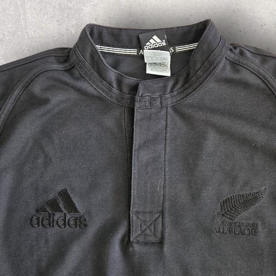 Vintage Adidas black High Collar Tshirt - L T-Shirts 75.00 NIS ADIDAS Vintage Adidas black High Collar Tshirt - L