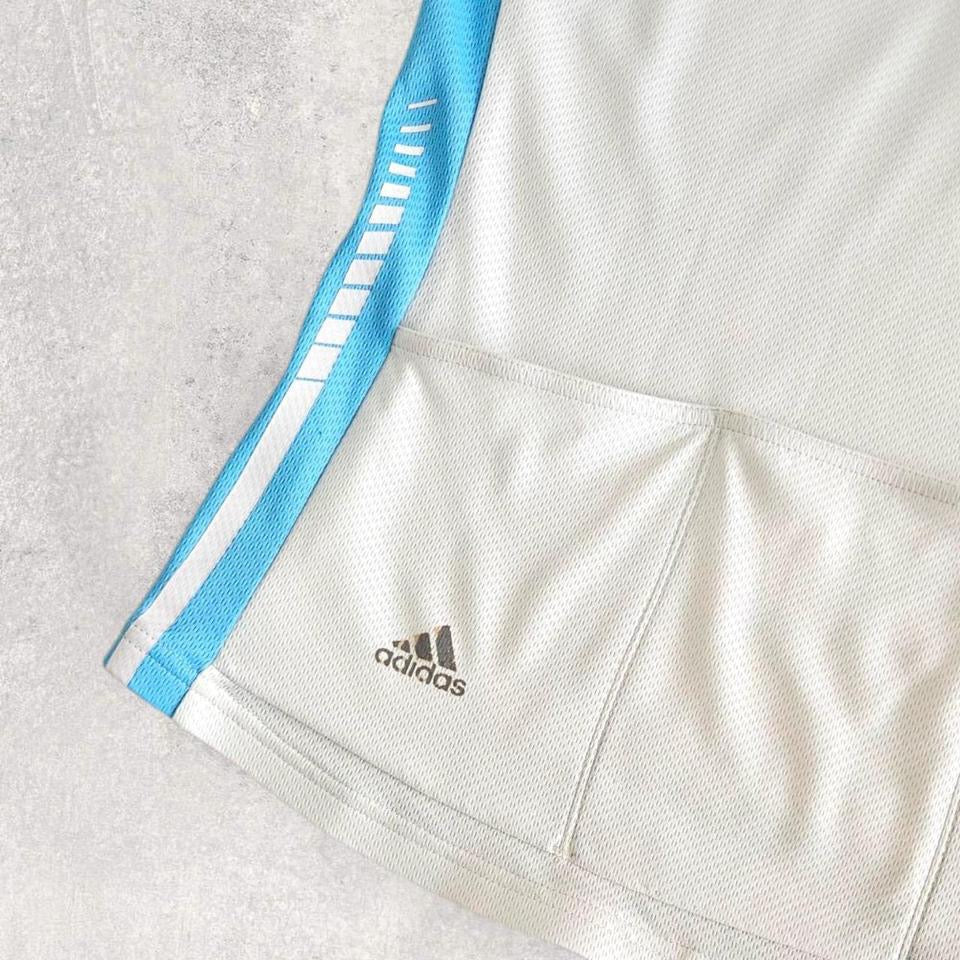 Adidas white/blue Woman’s Polo 1/4 Zip Activewear Tops 65.00 NIS ADIDAS Adidas white/blue Woman’s Polo 1/4 Zip